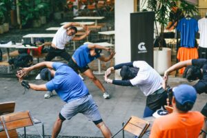 Group stretching outdoors before a run